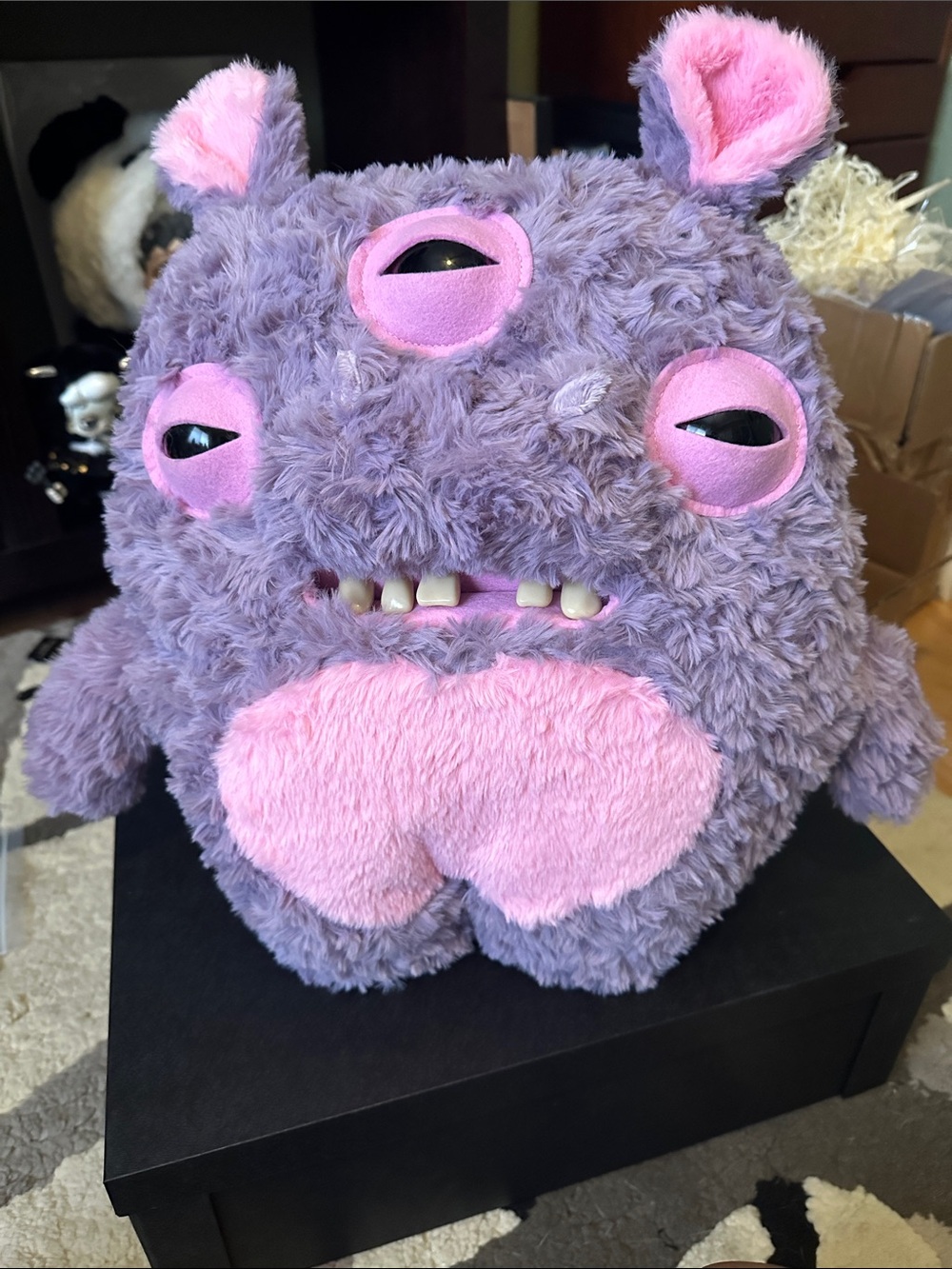 Cute Purple Three-Eyed Monster Plush with Pink Accents